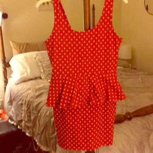 A cute red dress with polka dots.